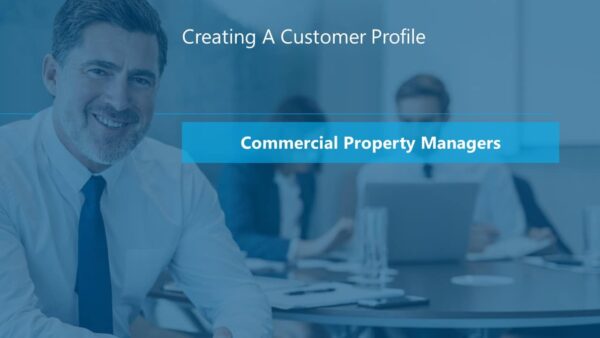 Business professional discussing customer profiles in a meeting about securing cleaning contracts with property management companies.