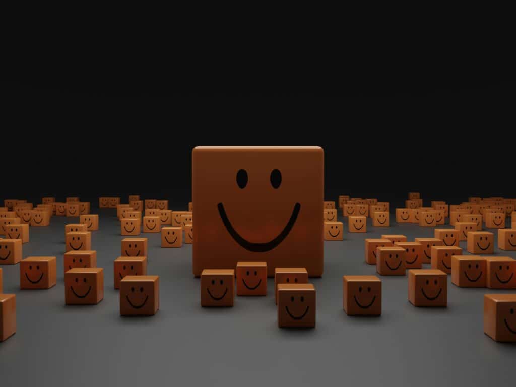 Smiling blocks representing happy and loyal customers.