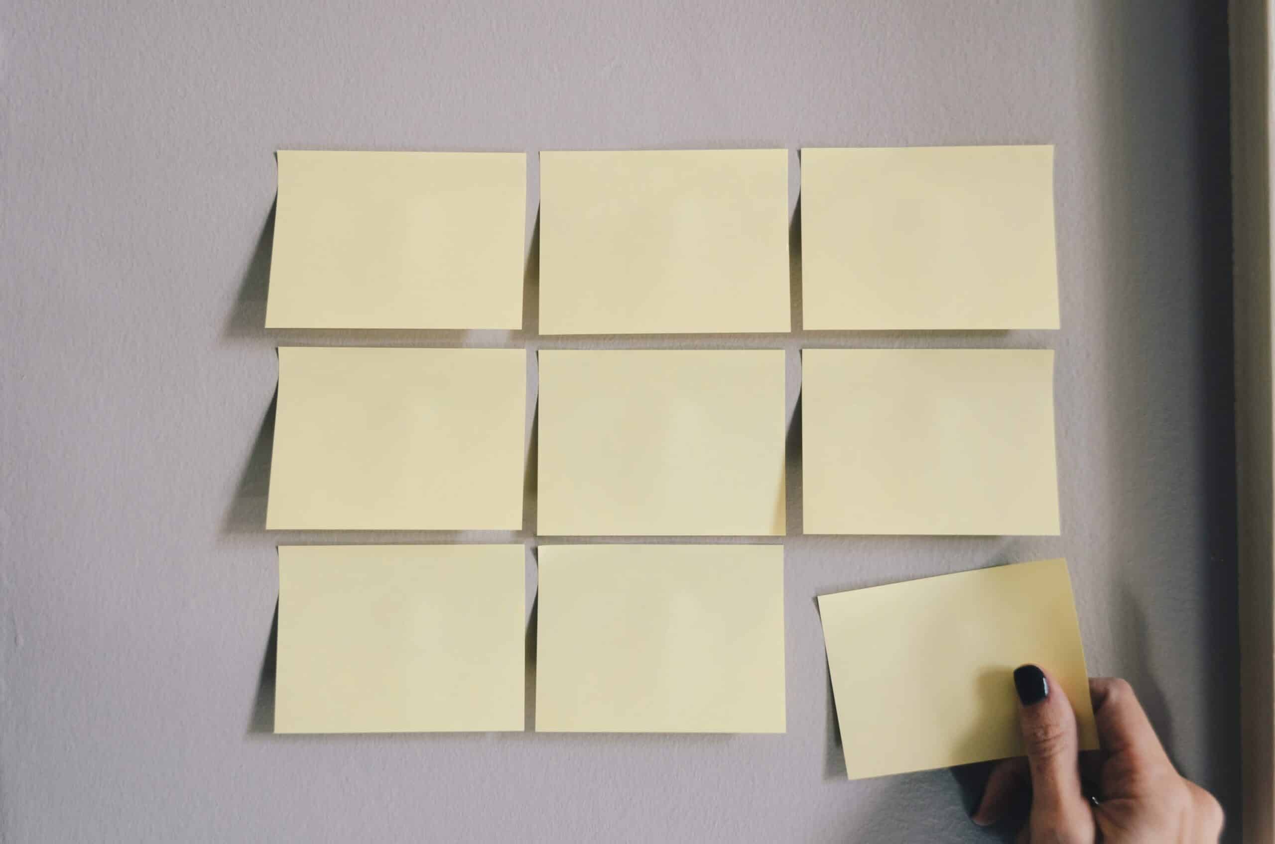 Sticky notes arranged on a wall for brand strategy planning, symbolizing SEO and brand maturity organization.